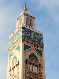 minaret in beige, green, blue