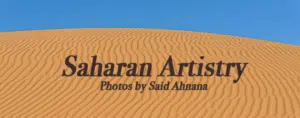 An aerial view of the Saharan dunes with wavy patterns that you will witness on the custom and shared tours by Open Doors Morocco