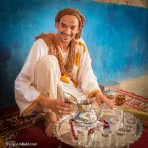Mustapha Kassi serving tea in his house in Tamnougalt, Morocco.