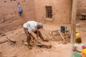 Mehidi working on the roofing project in Tamnougalt.