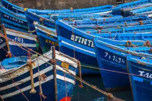 The port in Essouira in Morocco docking the typical blue wooden boats
