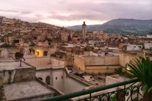 the medina in Fes seen from a balcony around the hour of the sunset