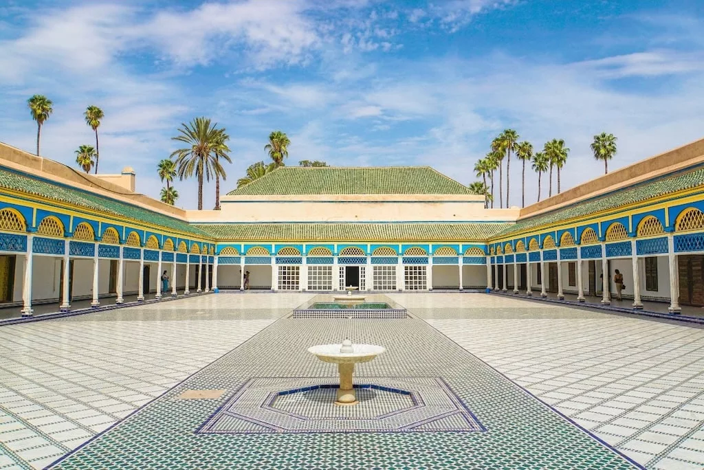 the beautifully decorated courtyard inside the Bahia Palace in Marrakech, one of Morocco's imperial cities