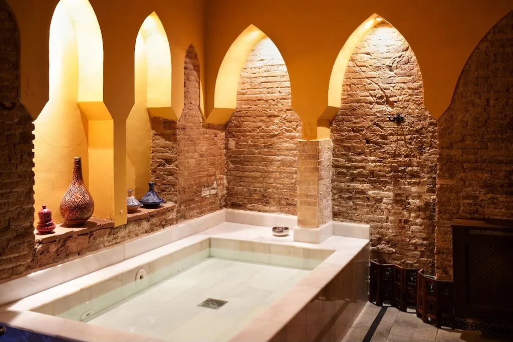 Inside a traditional Moroccan hammam, a perfect romantic activity to include in your Morocco itinerary.