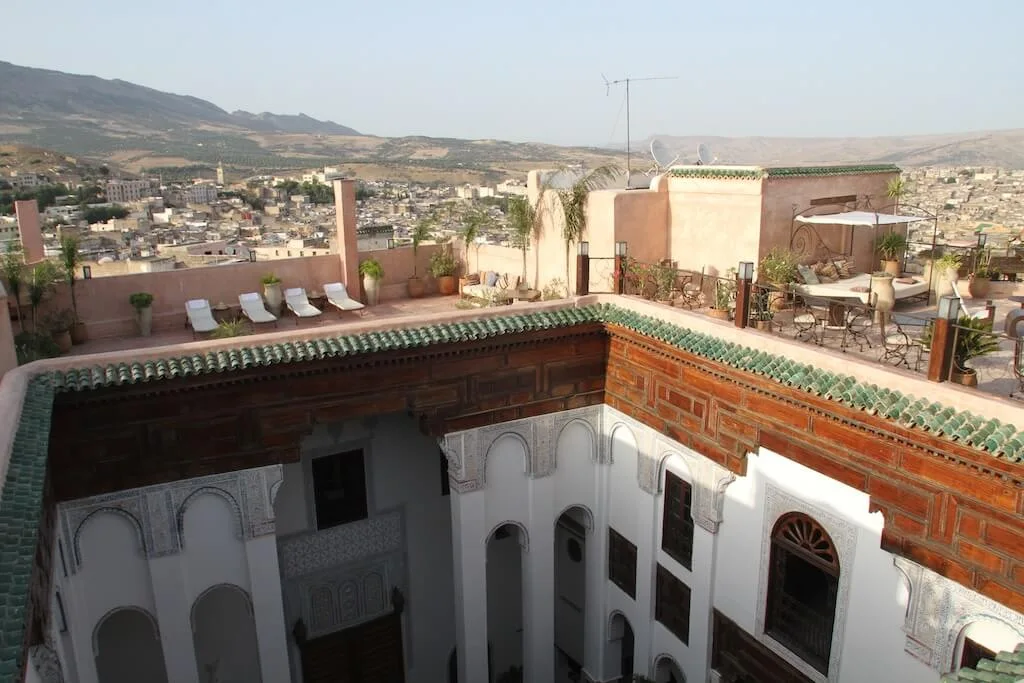 The sprawling terraces on the roof of Riad Laaroussa in Fes, one of our favorite accommodations in Fes for couples.