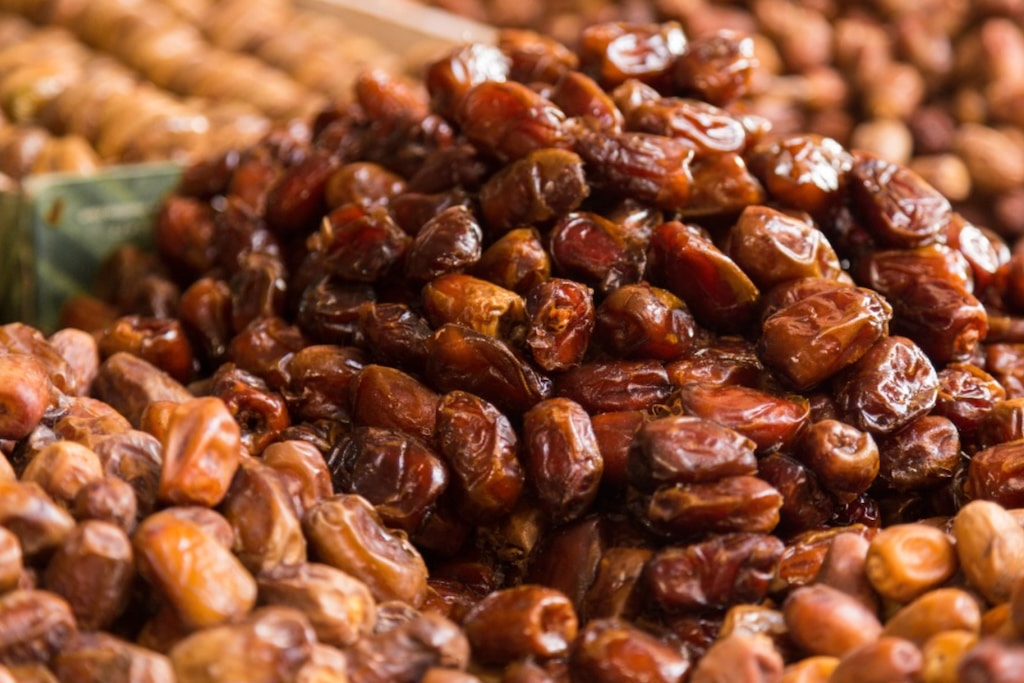 A close-up of a pile of delicious-looking dry dates that you can taste during the Erfoud Date Festival in Morocco