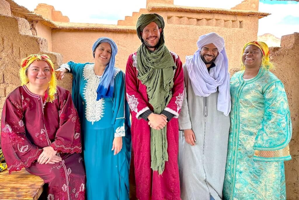 A group of local tour guides in Morocco ready to welcome travelers on our tours and help them plan their New Year in Morocco trip.